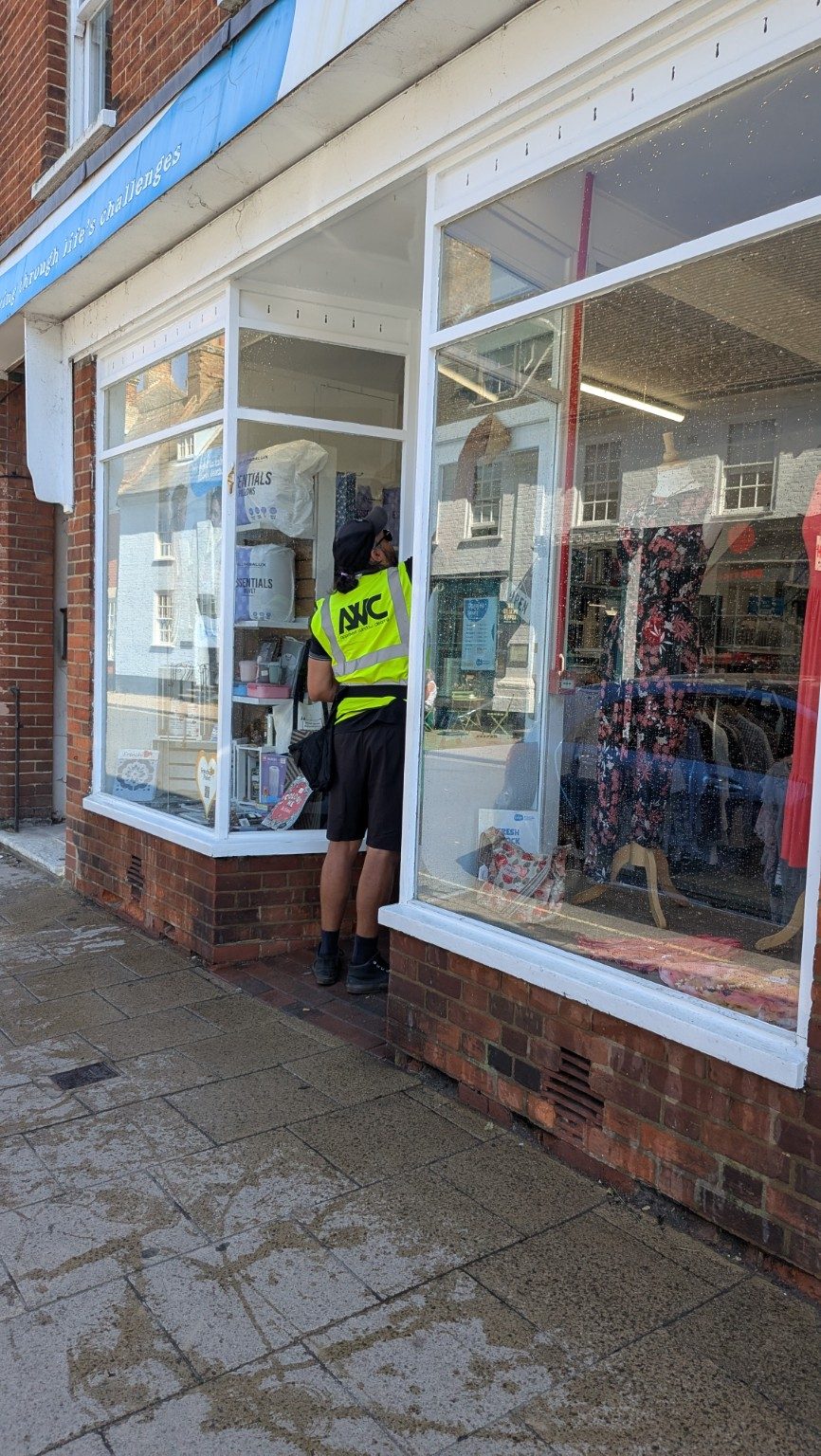 Southwold high street window cleaning action shot